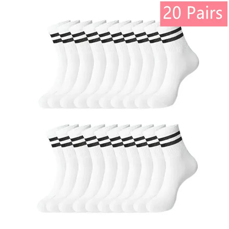20 paires de chaussettes en tricot blanches mi-mollet pour femmes, empilées en rangée