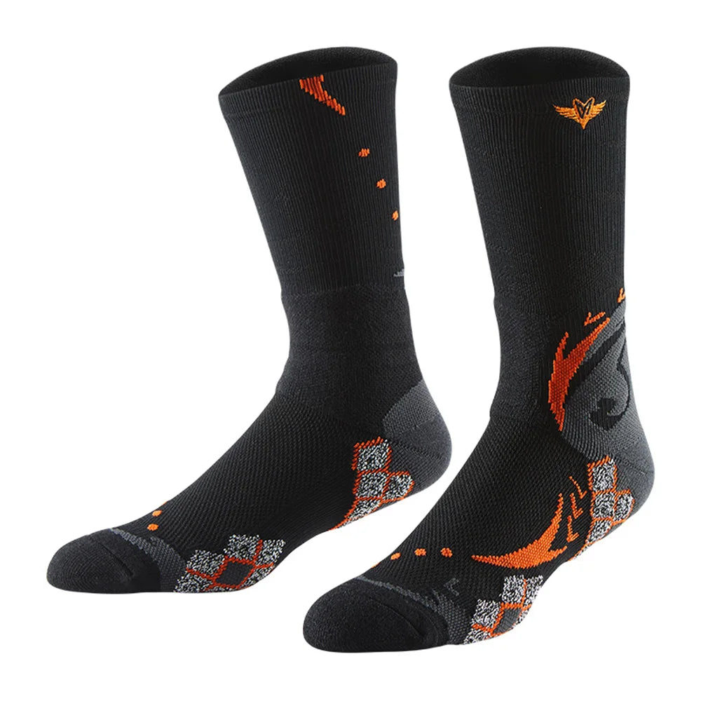 A pair of black athletic socks with orange and gray flame designs
