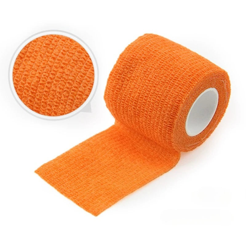 Roll of orange self-adhesive elastic bandage tape with a circular swatch shown next to it.