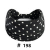 Black polka dot knotted headband for yoga and workout