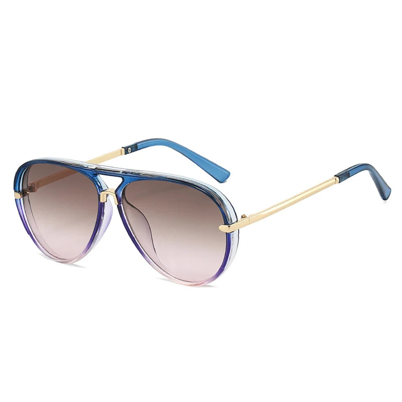 Retro pilot sunglasses with gradient lenses featuring blue frames and gold accents.