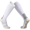 A pair of white long football training socks for men shown flat.