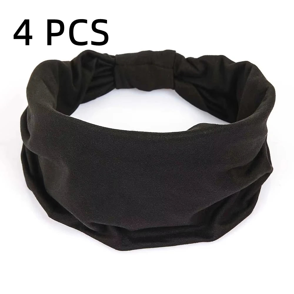 Four black non-slip elastic headbands for fitness and hair