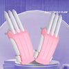 A pair of pink and white carrot-themed fidget stress relief toys are displayed against a purple background.