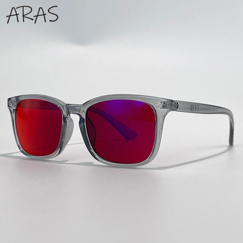 A pair of ARAS multi-functional anti-blue light glasses with red and purple lenses resting on a white surface.