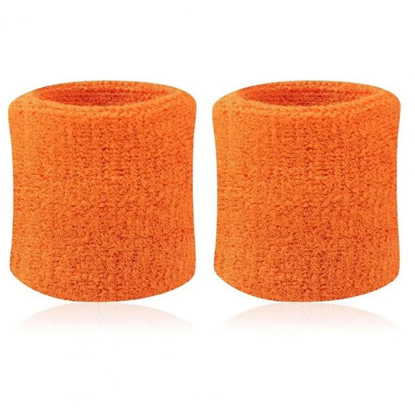 Deux bracelets de sport tricotés orange affichés côte à côte.