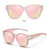 Pink round sunglasses shown from the front and a 45-degree angle.