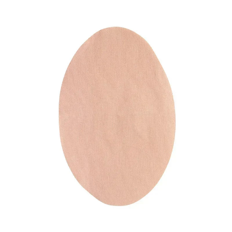 A round, beige anti-wear thigh patch for friction relief.