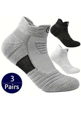 A set of three pairs of gray and black breathable ankle boat socks shown in various angles.