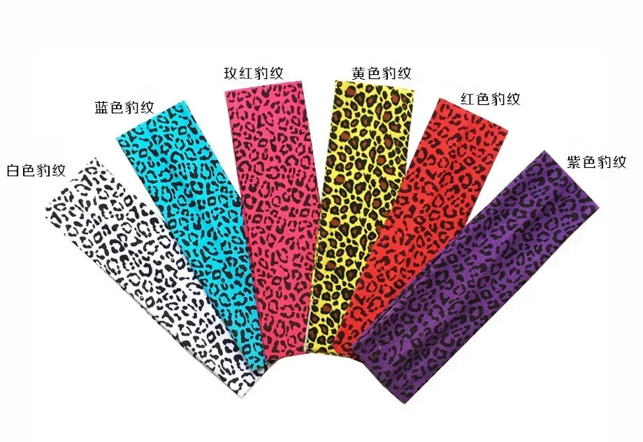 A collection of women's sports headbands featuring various animal prints including leopard, solid colors, and abstract patter