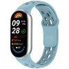 A light blue silicone smart watch band with a digital display showing time, date, and activity metrics.