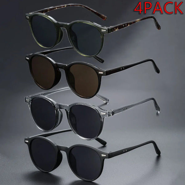 A stack of four pairs of brown tortoiseshell retro round sunglasses
