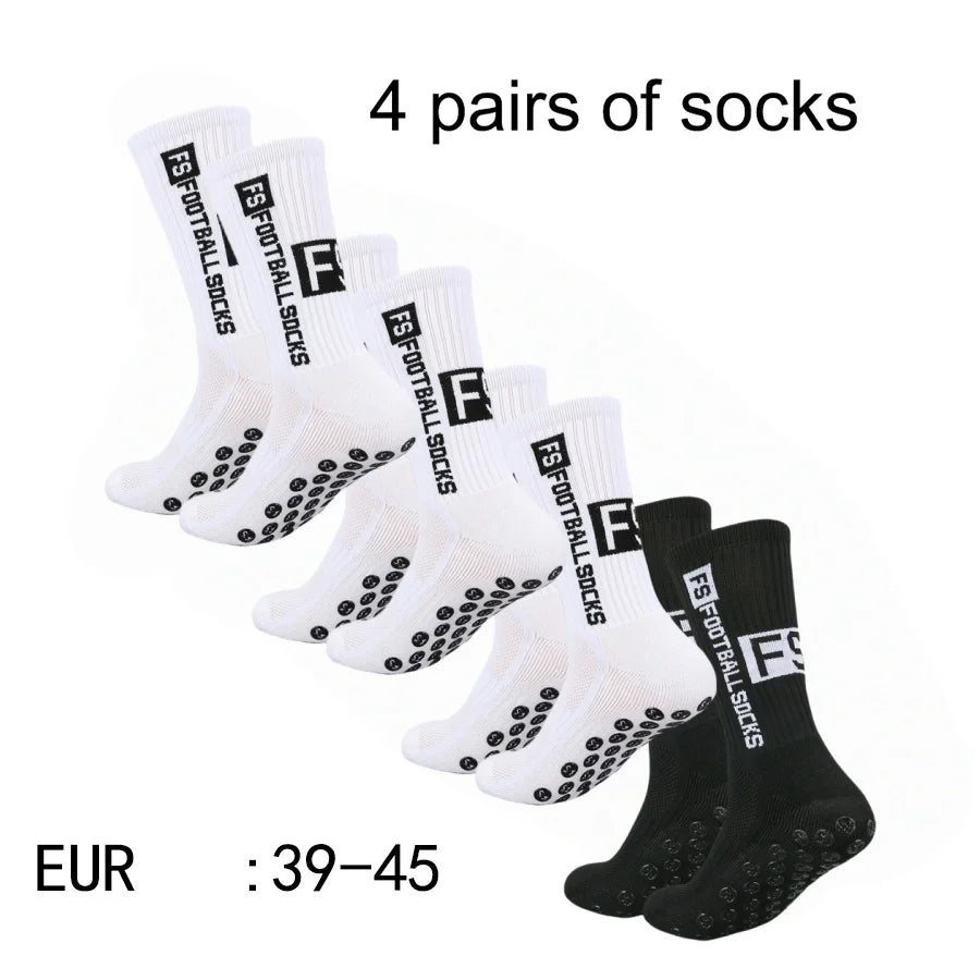 Four pairs of white athletic soccer socks with black grip and the FS brand logo