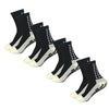 A set of black and white multi-sport silicone grip socks for men displayed on a white background.