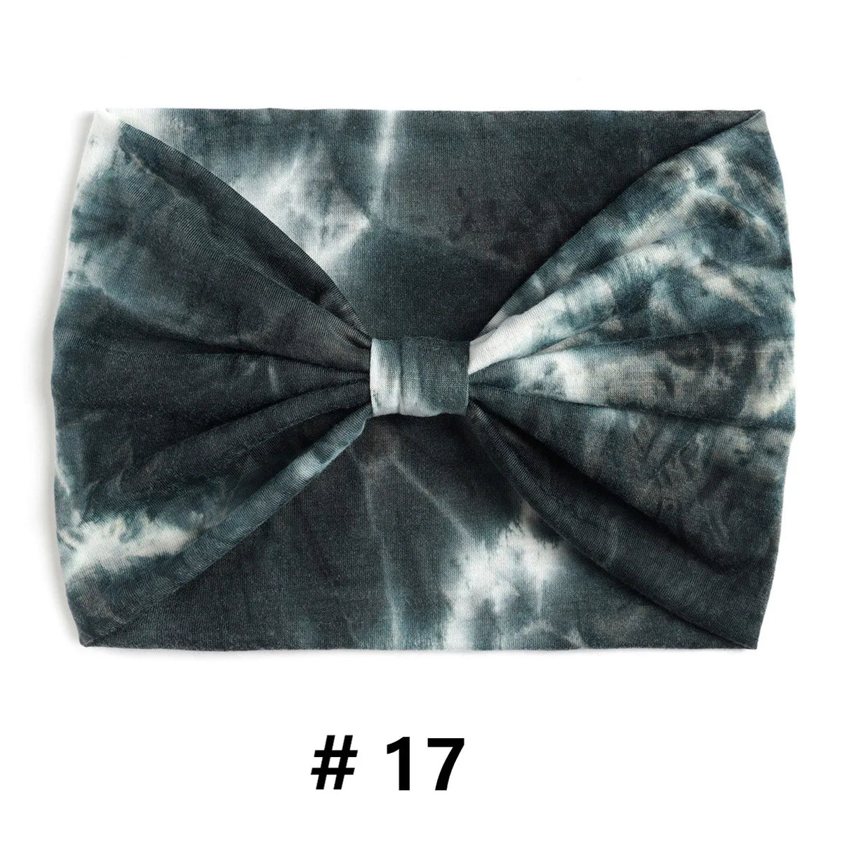 Un bandeau en coton tie-dye gris foncé noué en nœud.