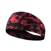 A black and red patterned elastic sports headband shown from the side.