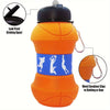 Orange silicone sports water bottle with a leak proof drinking spout and metal carabiner clips