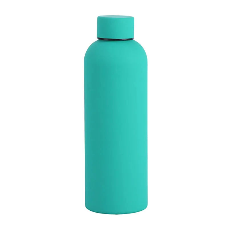 A teal insulated stainless steel thermos cup with a light blue cap.