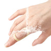 A hand is being washed under running water, showing soap suds and water flow.