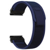 A dark blue nylon strap for a sports watch, shown from the side.