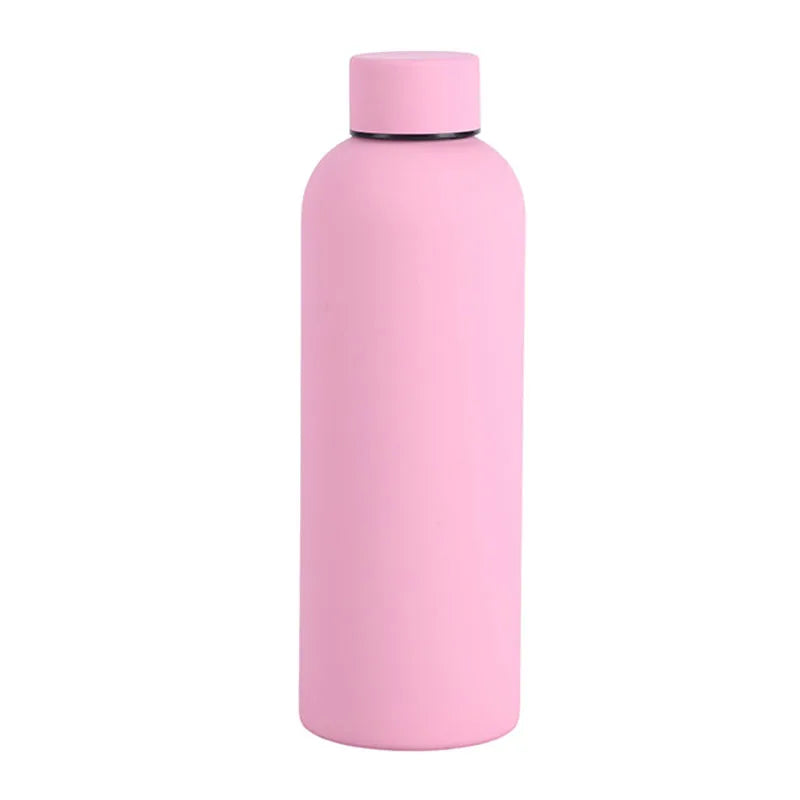 A pink insulated stainless steel thermos cup with a silver lid.