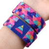 A colorful LGBT stretch wristband bracelet featuring a geometric pattern in pink, purple, and blue.