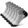 A stack of gray and black athletic knit ankle socks for men, displayed diagonally.