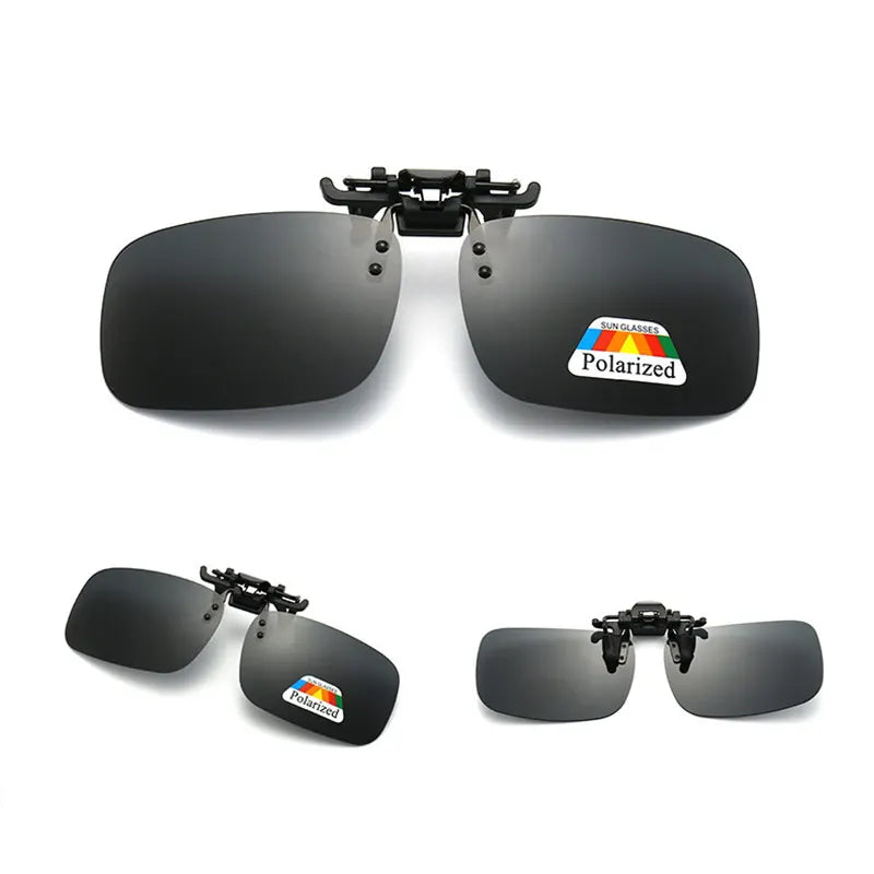 A pair of black polarized driving sunglasses with a black frame and a logo indicating polarization.