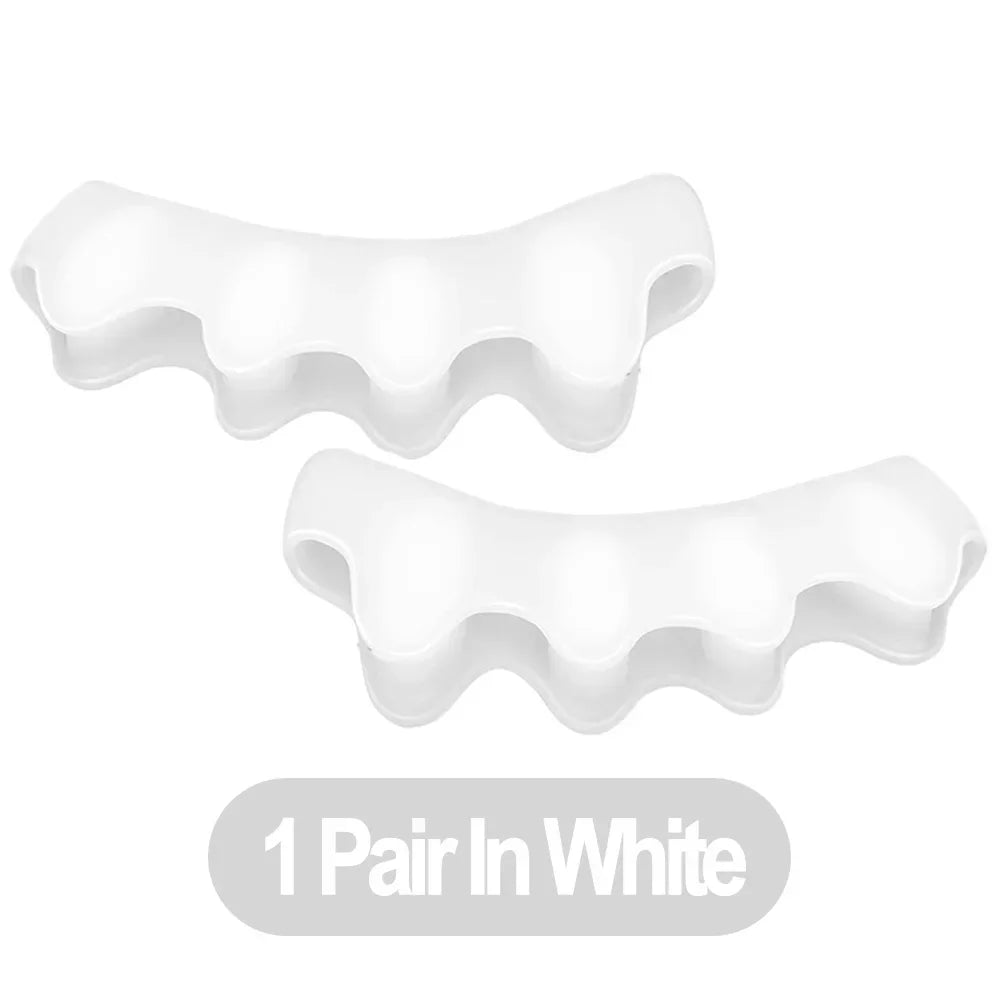 A pair of white silicone toe separator and foot straightener tools.