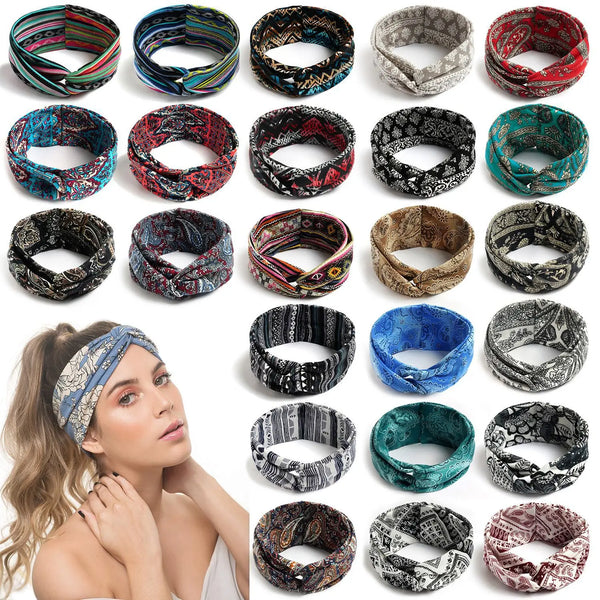 A collection of bohemian vintage print headbands in various colors and patterns displayed on a model's hair.