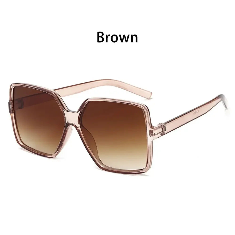 Brown vintage oversized retro sunglasses with rose gold frames and tinted lenses