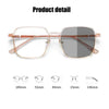 A pair of rose gold photochromic diamond style eyeglasses shown against a white background.
