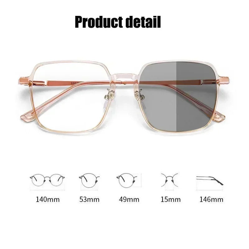 A pair of rose gold photochromic diamond style eyeglasses shown against a white background.