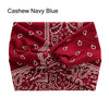 Bandeau en tissu bordeaux profond avec motifs paisley et géométriques blancs.