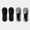 Four pairs of men's invisible boat socks in black and gray shown from the top view.