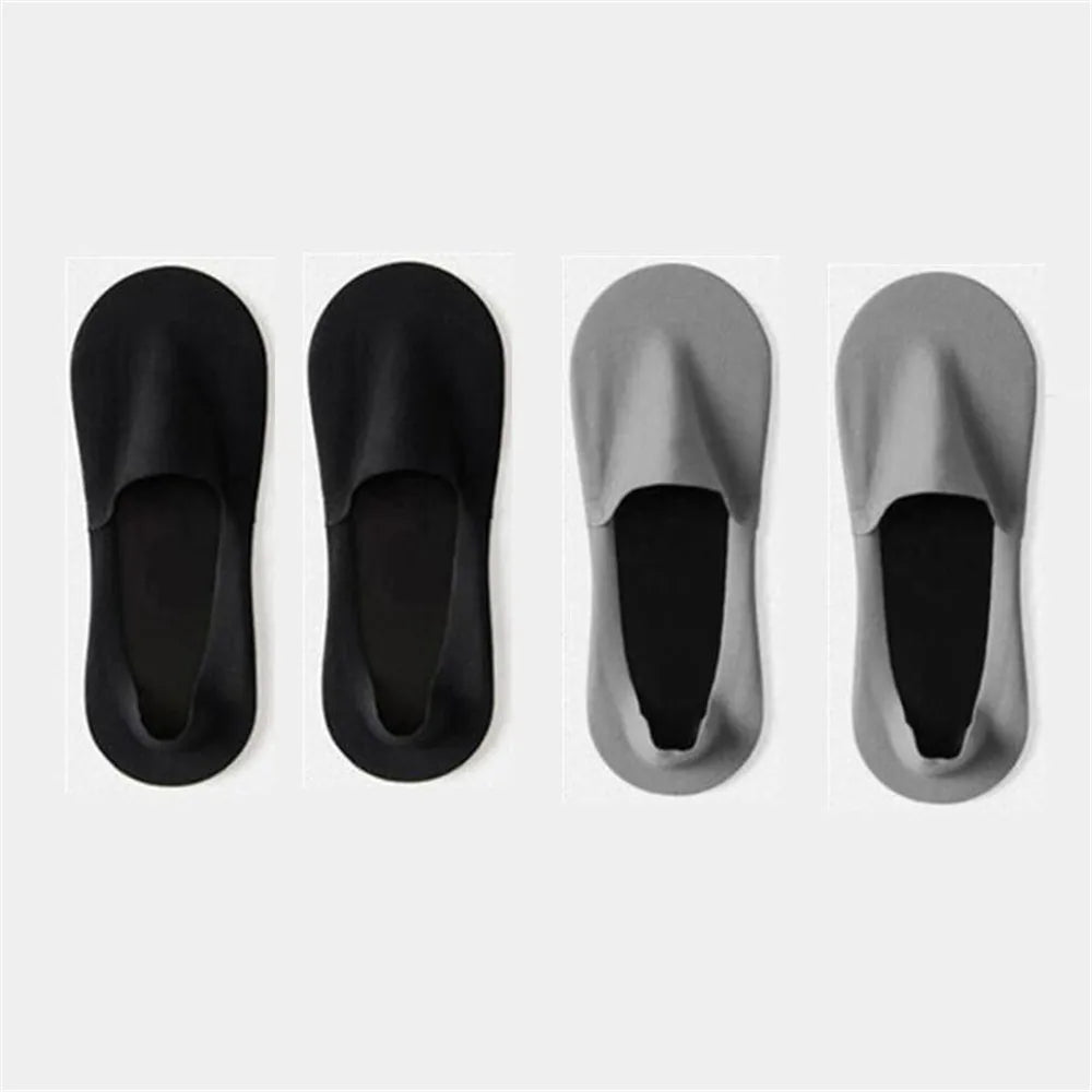 Four pairs of men's invisible boat socks in black and gray shown from the top view.
