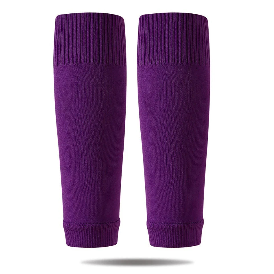 A pair of purple professional compression soccer and sports sleeves.