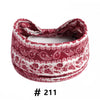A close-up of a maroon and white patterned boho cotton turban headband