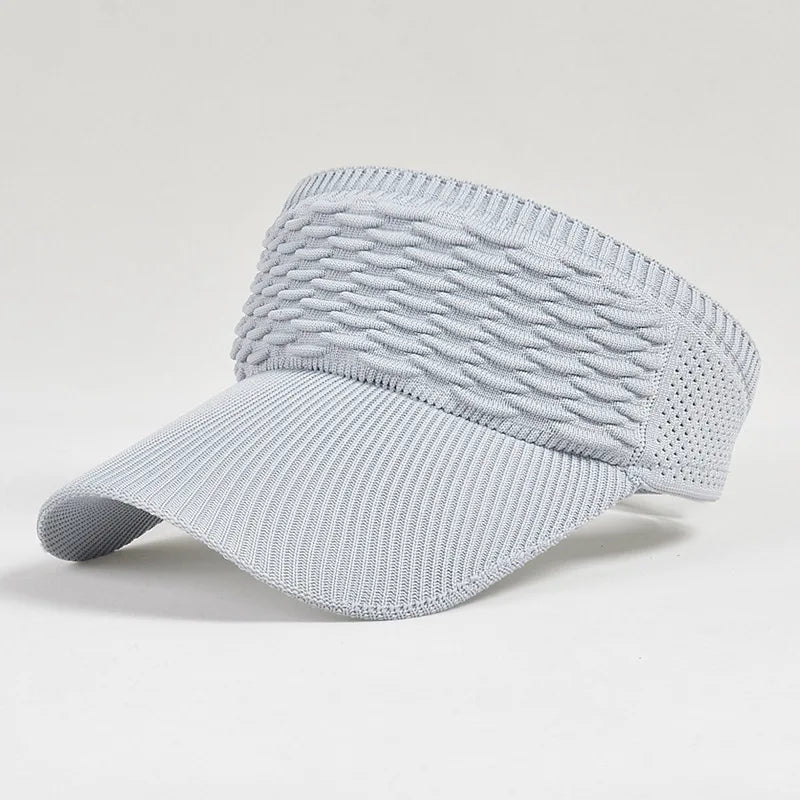 A light gray breathable anti-UV adjustable sun hat with a mesh back and curved brim.