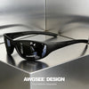 A pair of black polarized sports sunglasses resting on a metallic surface.