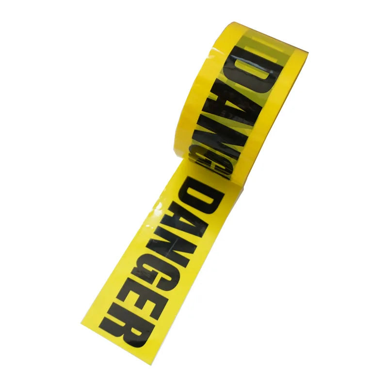 Yellow industrial safety warning tape roll with black lettering reading DANGANGER