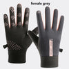 A pair of female grey thermal cycling and running gloves shown against a white background.