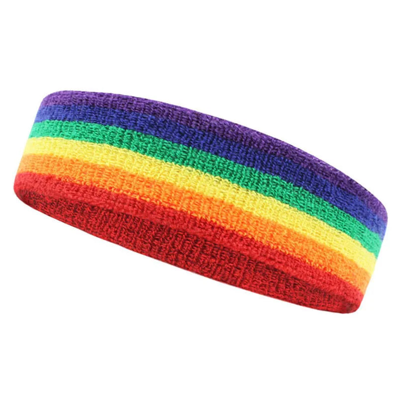 A colorful, striped moisture-wicking athletic headband featuring rainbow colors like red, orange, yellow, green, blue, and pu