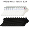A collection of 10 pairs of white and 10 pairs of black ankle socks displayed in rows.