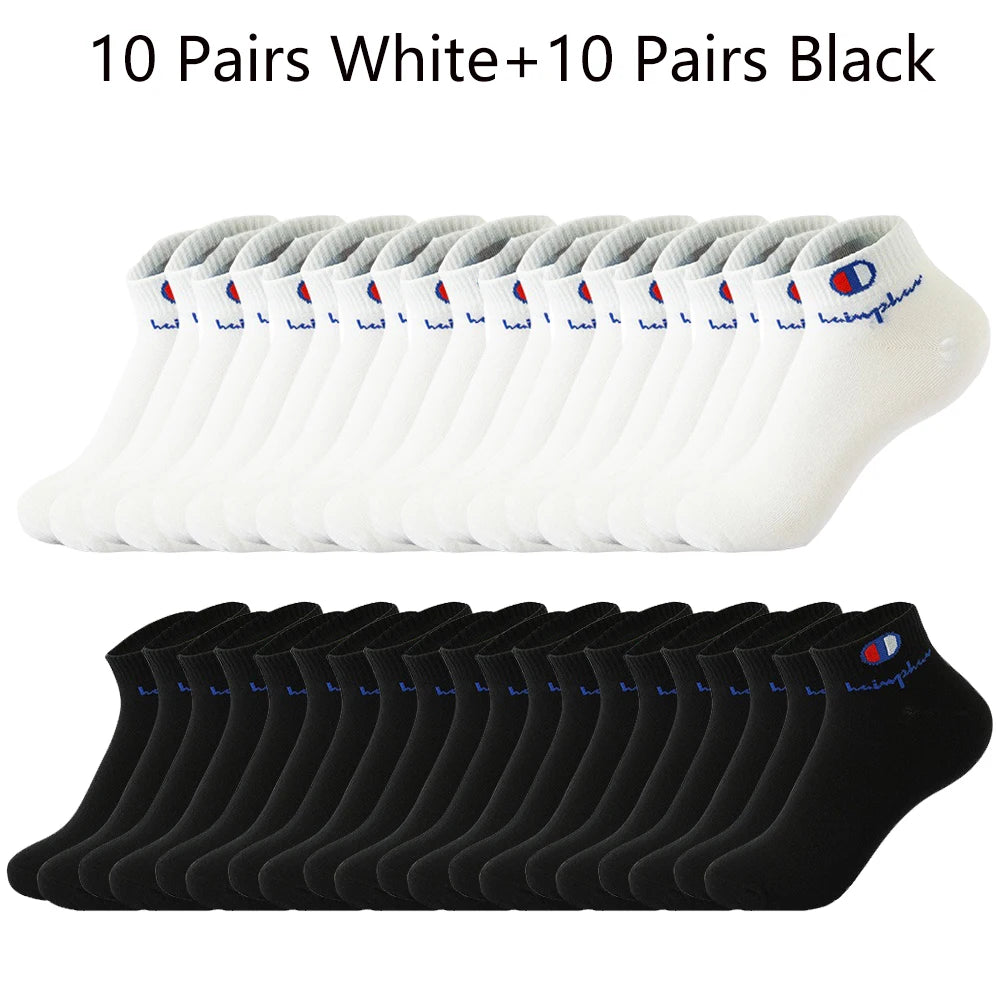 A collection of 10 pairs of white and 10 pairs of black ankle socks displayed in rows.