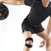 A person wearing a black athletic shirt and shorts is holding a basketball, demonstrating a pressurized knee support sleeve.