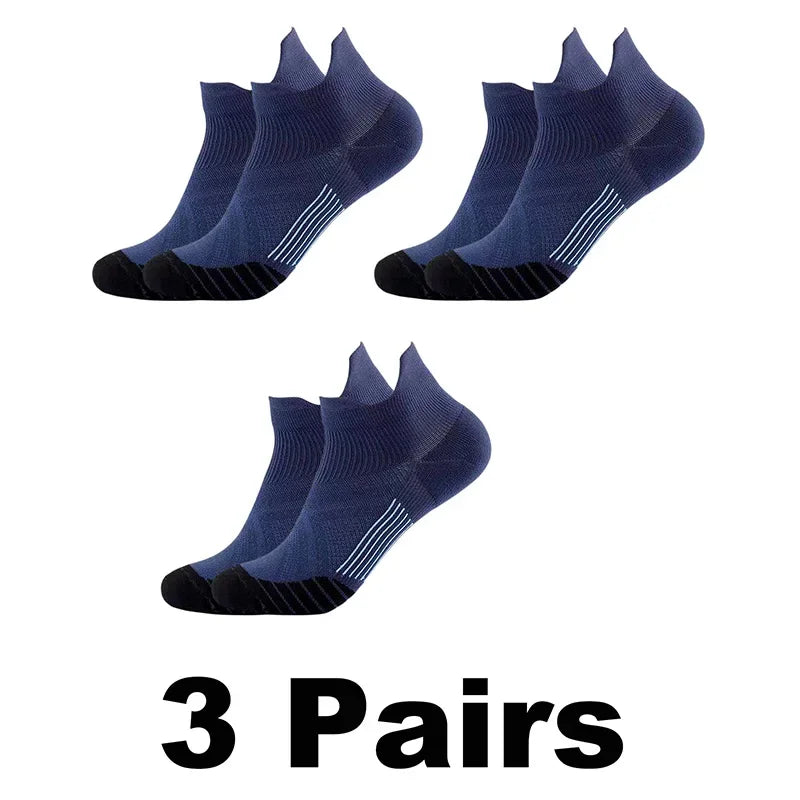 Three pairs of navy blue performance compression sports socks shown from the side.