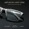 A pair of silver-framed anti-blue light reading glasses with a clear lens displayed on a dark background.