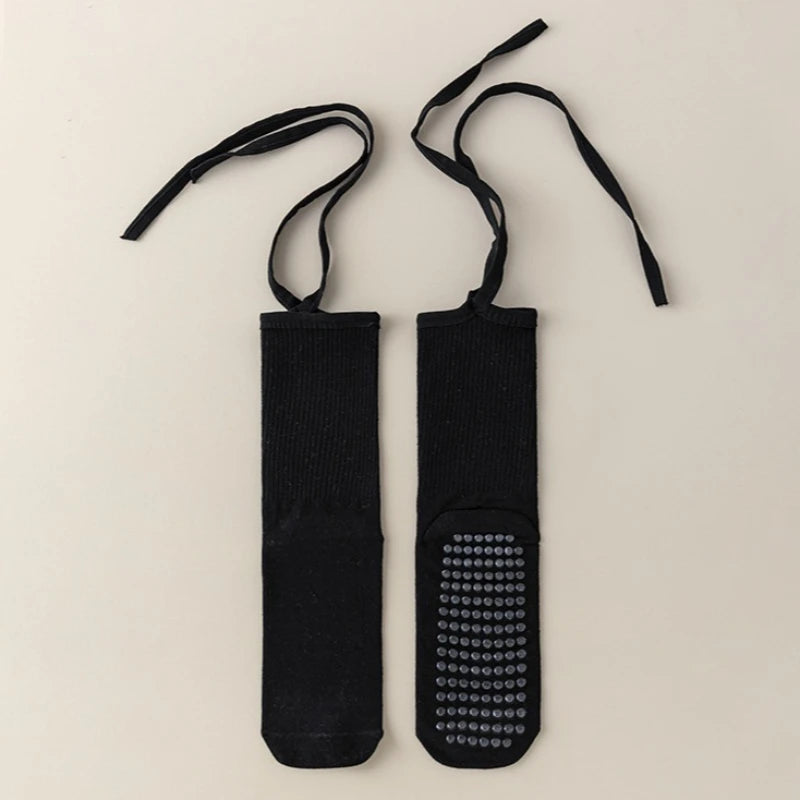 Black silicone anti-slip yoga socks with elastic drawstrings