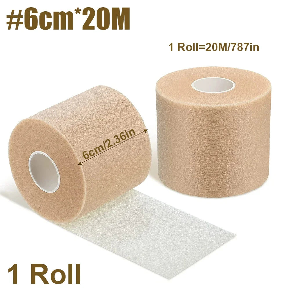A roll of beige athletic tape measuring 6cm wide and 20 meters long, with a piece unwound.